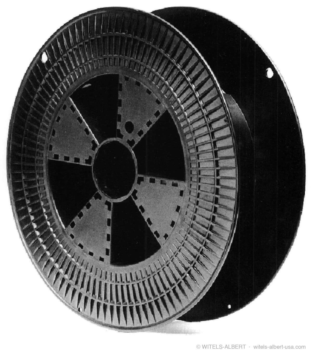 Photograph of a wire spool with flanged sides and a spoked core, used for transporting endless material wound in layers.