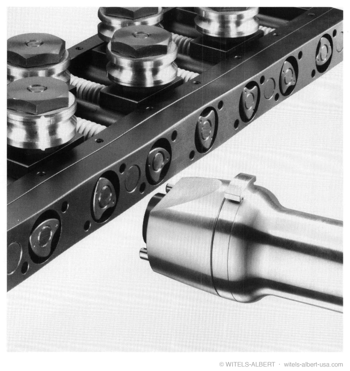 Photograph/diagram of the WITELS-ALBERT automatic roll positioner unit.